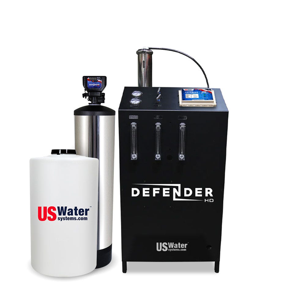 The Defender Commercial RO System By US Water Systems (2000 - 16000 GPD) is a sustainable water treatment solution with an eco-friendly design, large tank, control unit, and white tank with logo. Ideal for those needing an efficient and environmentally responsible commercial RO system.