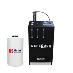 The eco-friendly Defender Commercial RO System by US Water Systems Inc, with a black filtration unit and a white tank marked with the US Water Systems logo, demonstrates sustainable practices in commercial water filtration.