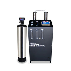 The eco-friendly Defender Commercial RO System by US Water Systems features a tall cylindrical tank left of a sleek black rectangular unit labeled Defender, equipped with gauges, pipes, and a digital control panel—ideal for any commercial use.