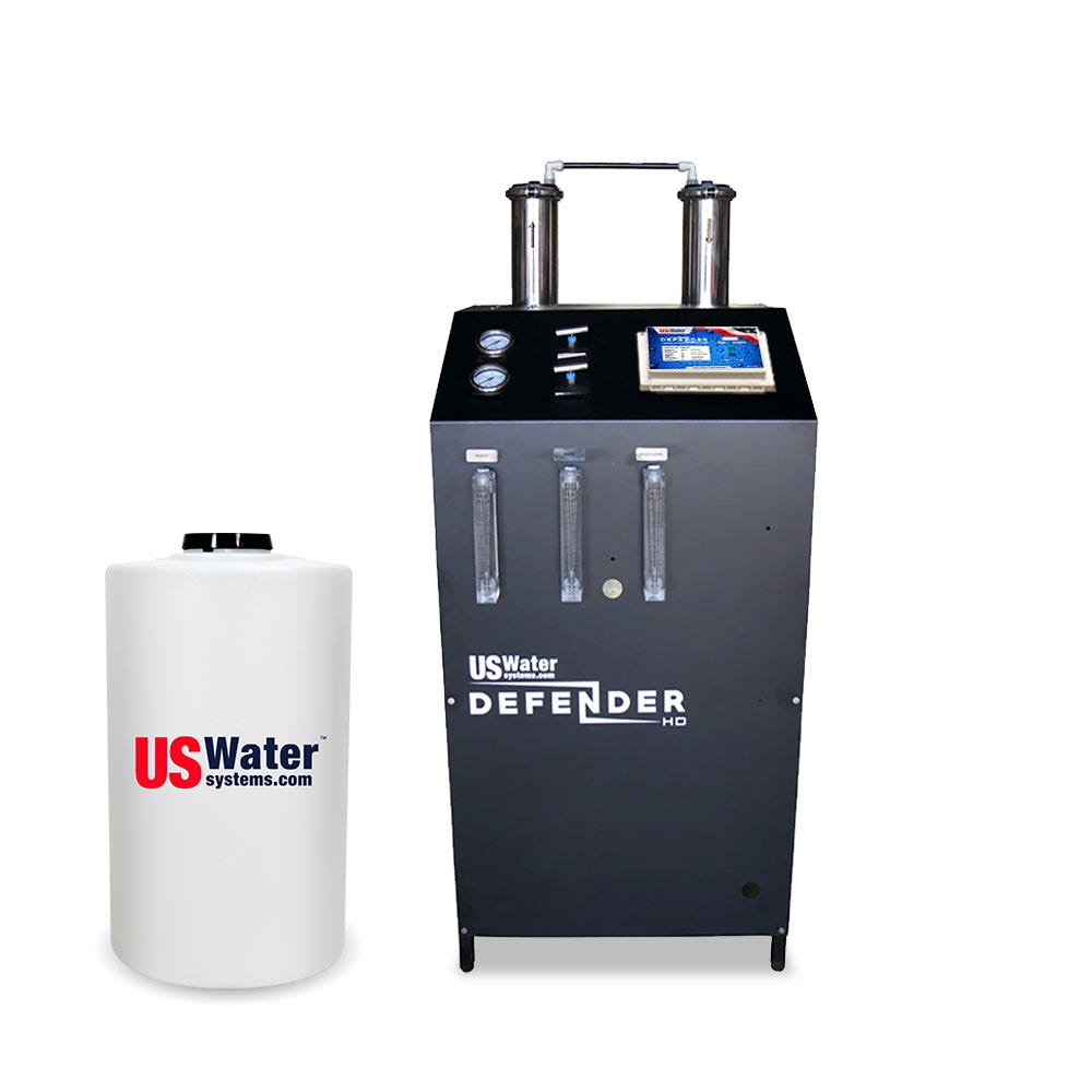 The Defender Commercial RO System by US Water Systems Inc features an eco-friendly control panel, gauges, dual metal cylinders, and a white branded cylindrical tank.