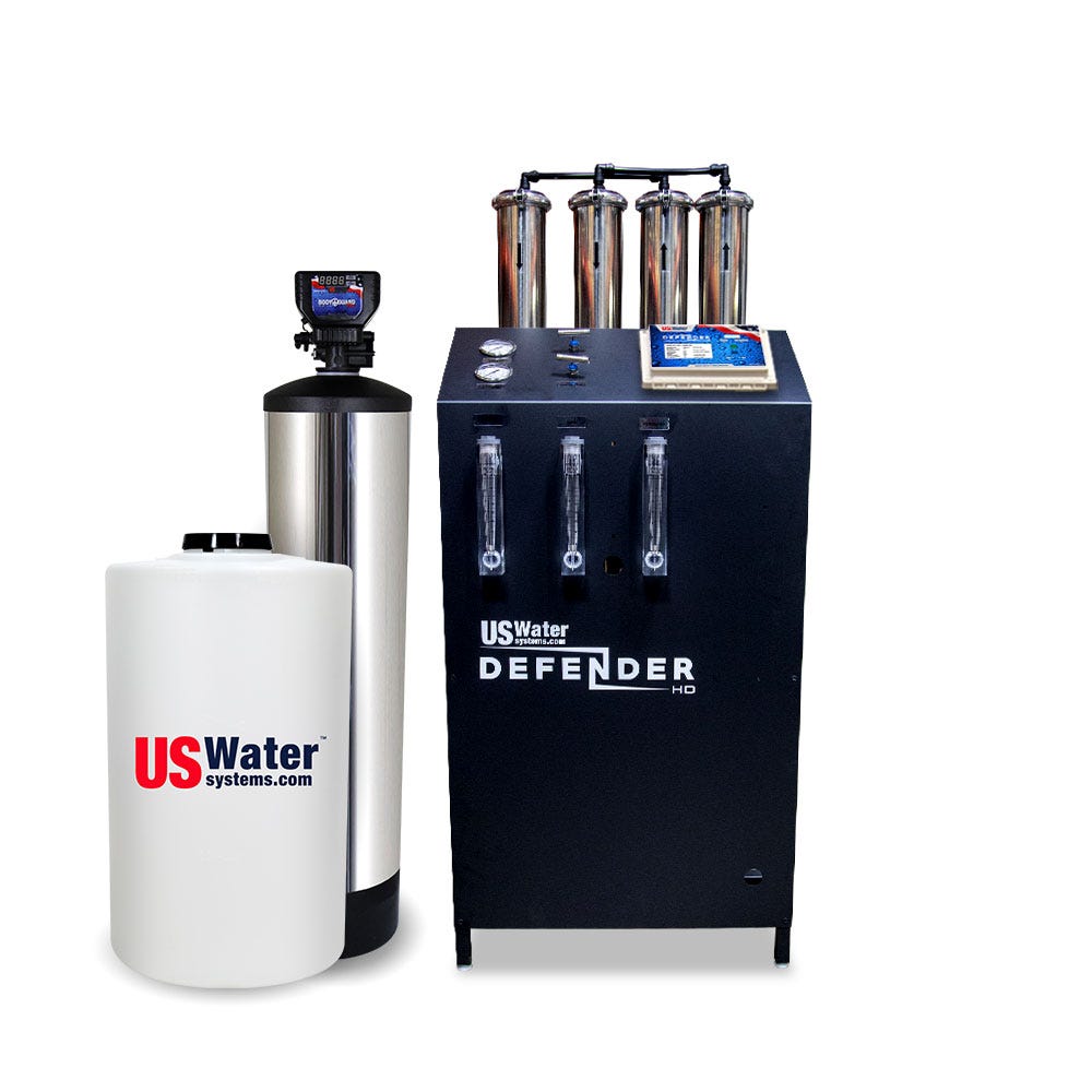 The Defender Commercial RO System by US Water Systems Inc is an eco-friendly filtration system with cylindrical tanks and a digital display, ideal for sustainable living.