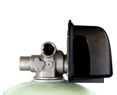 Close-up of the US Water Commercial Backwashing Greensand Plus Filter 1.5 Inch (10-28 GPM) by US Water Systems Inc, showing a metal valve with black cover on a green tank, designed for iron removal, isolated on white background.