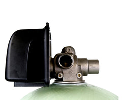 A close-up of a US Water Backwashing Sediment Filter 1.5 Inch by US Water Systems Inc shows its stainless steel valve body on the pressure regulator attached to the cylinder with a gauge housing, set against a white background.
