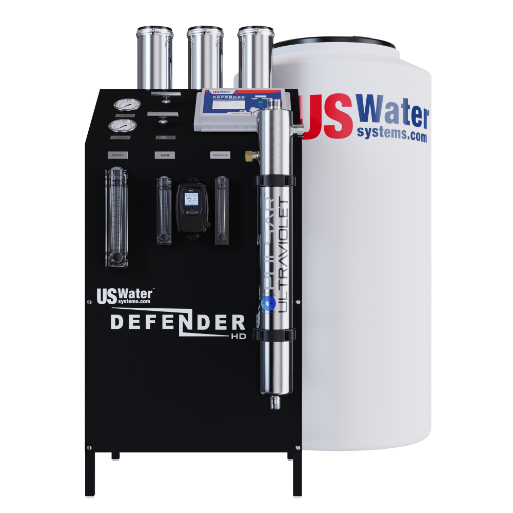 The industrial filtration system includes a black Defender Whole House Reverse Osmosis System control panel and a white tank from US Water Systems Inc., which integrates seamlessly with a commercial pump for efficient performance.