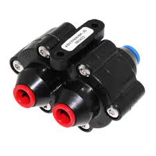 The US Water Systems All American Reverse Osmosis Auto-Shutoff Valve (ASOV-14QB) is a black and red plastic pneumatic fitting with dual connectors, screws, and a top label. It enables effortless installation and reliability for RO systems.